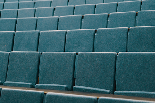 Image of empty blue seats